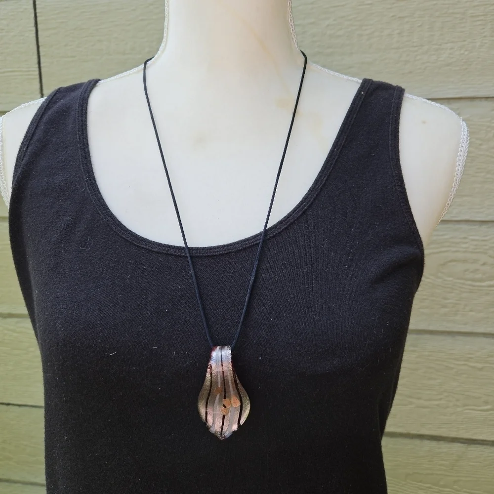 striped art glass pendant on black cord